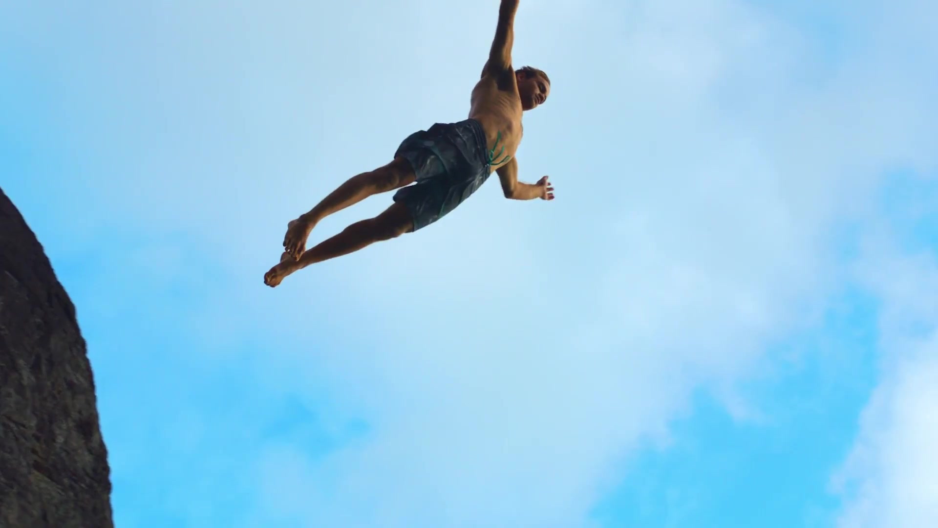 A person leaping from a cliff into the Caribbean — U.S. Virgin Islands, Real Nice campaign by ASMBLY Entertainment